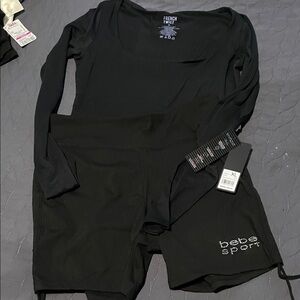 bebe Black Athletic Shorts and long sleeve silky dri weave ..extra long sleeves.